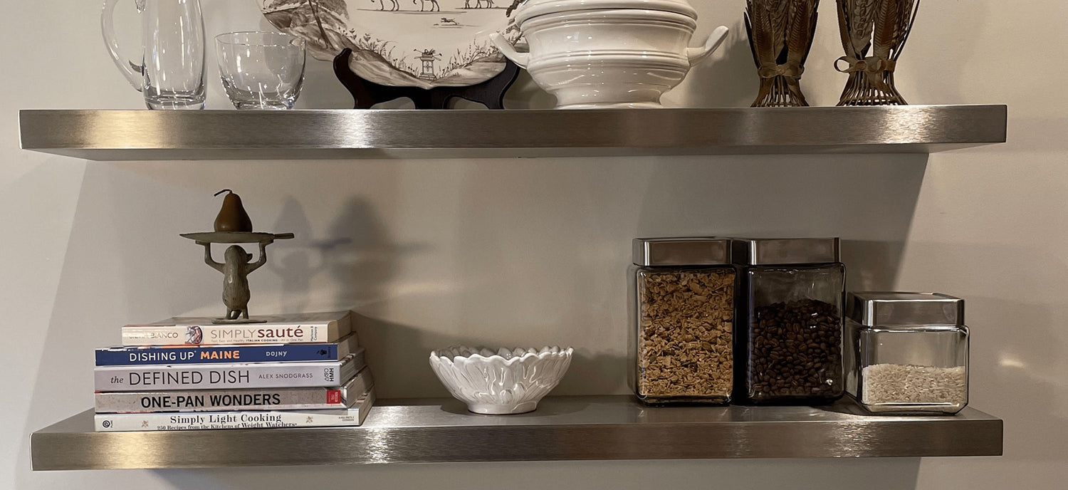 floating shelves, stainless steel shelves with books, plates, glasses